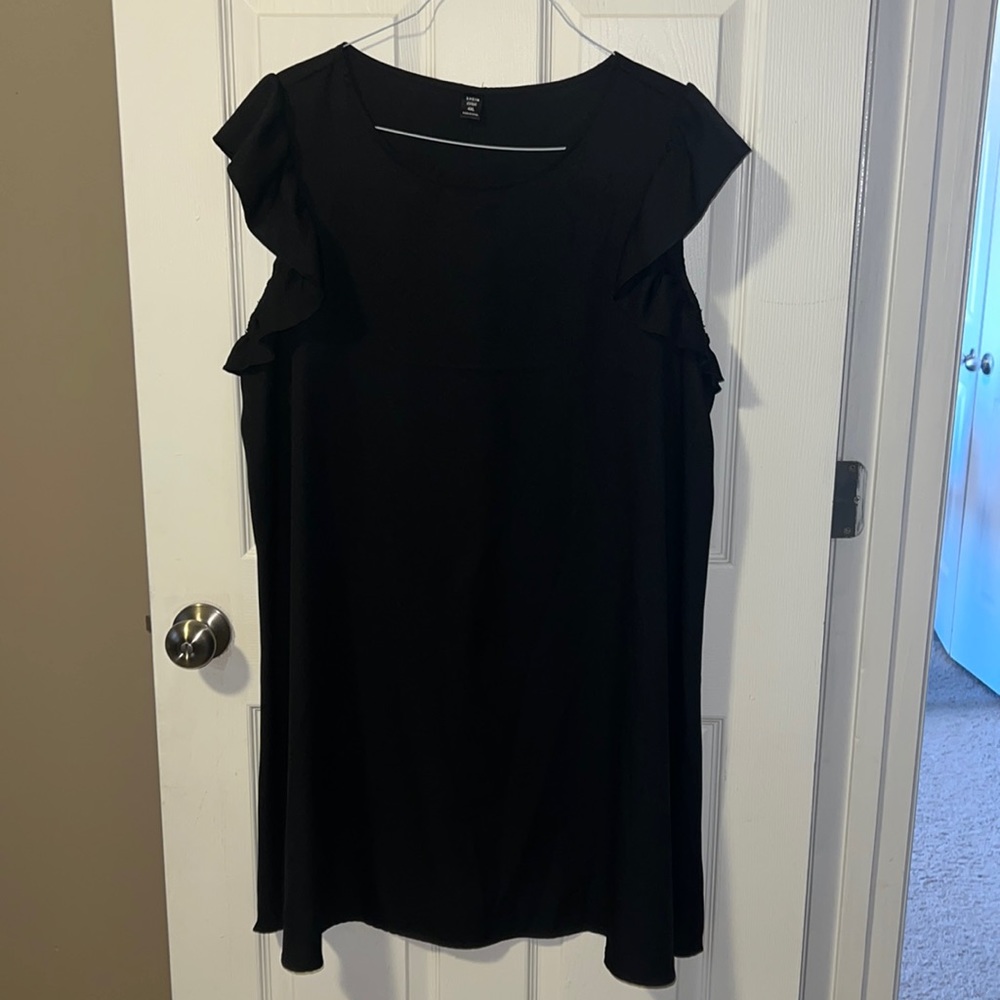 Black dress with ruffle cap sleeve